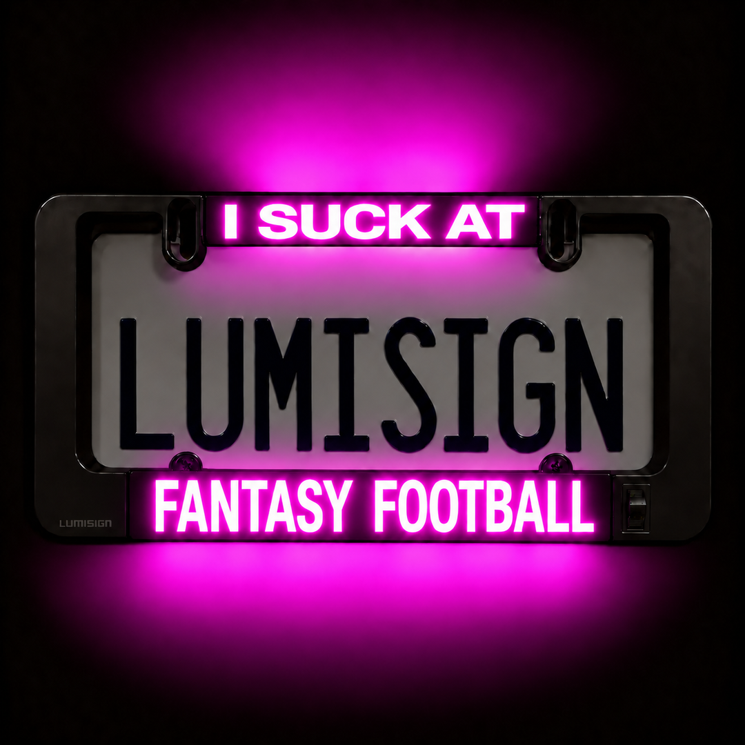 Close-up of glowing license plate frame: 'LUMISIGN' and 'FANTASY FOOTBALL'