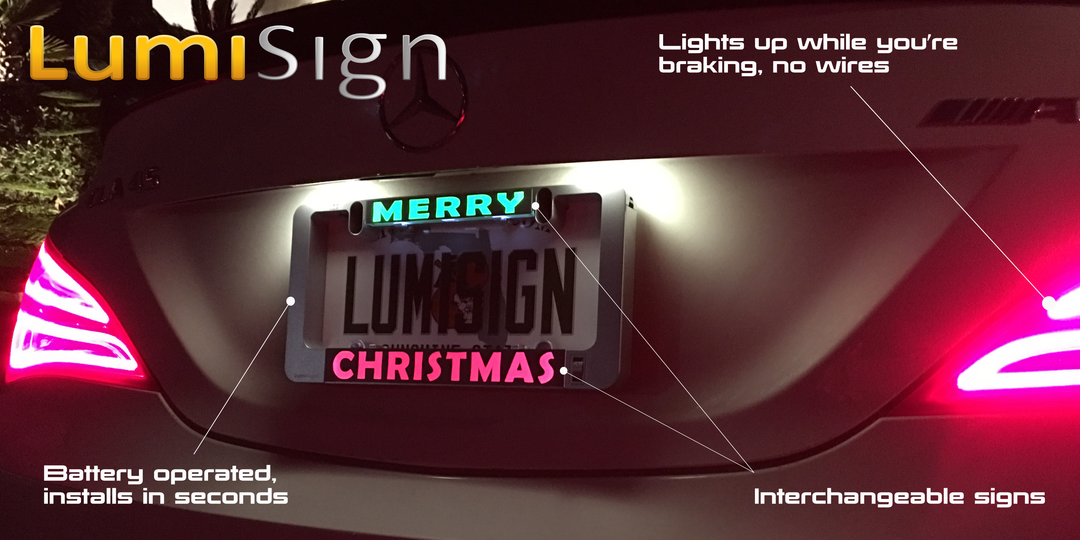 Illuminated LumiSign insert with Merry Christmas text and multicolor light glow