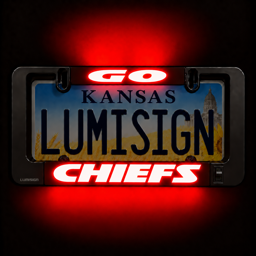 LUMISIGN license plate frame with red CHIEFS lighting and KANSAS LIMISIGN text