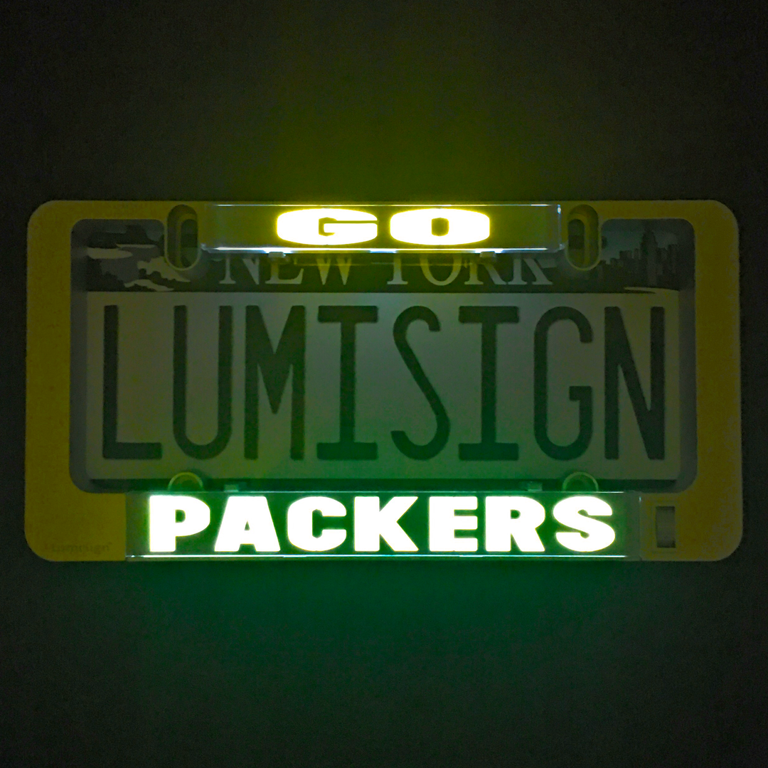 Illuminated LumiSign PACKERS logo insert with bright green letters