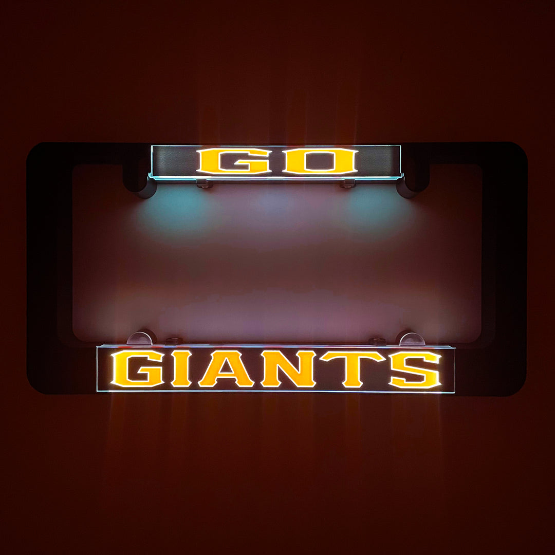 LumiSign insert with GO and GIANTS lettering, illuminated in a dark display