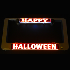 Glowing Happy Halloween light inserts on dark holder with HALLOWEEN strip