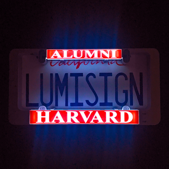 Harvard alumni illuminated inserts showing “ALUMNI” and “HARVARD” lettering