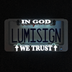 LumiSign insert with glowing 'IN GOD' and 'WE TRUST' lettering on dark backing