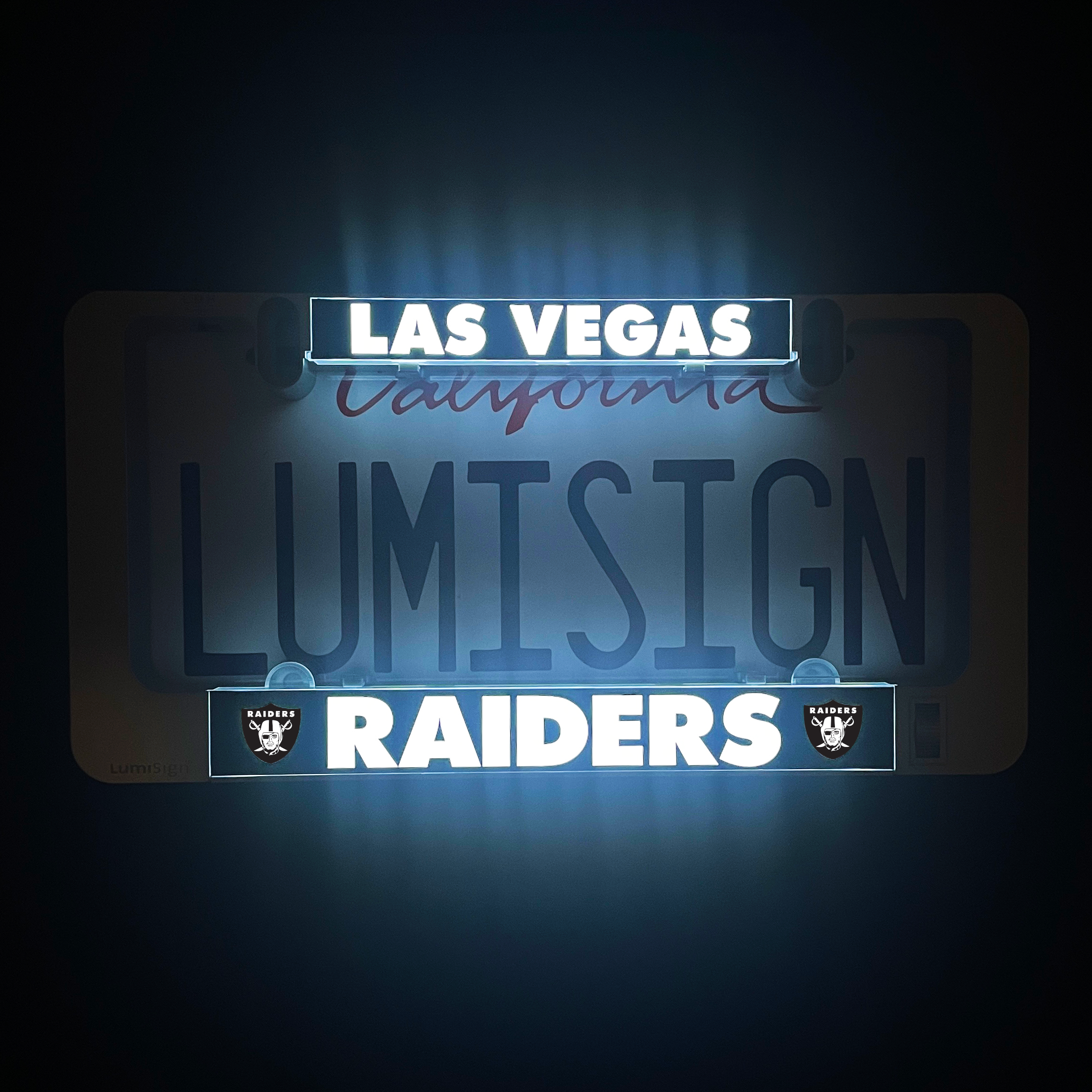 LumiSign Raiders illuminated license plate frame insert in black frame