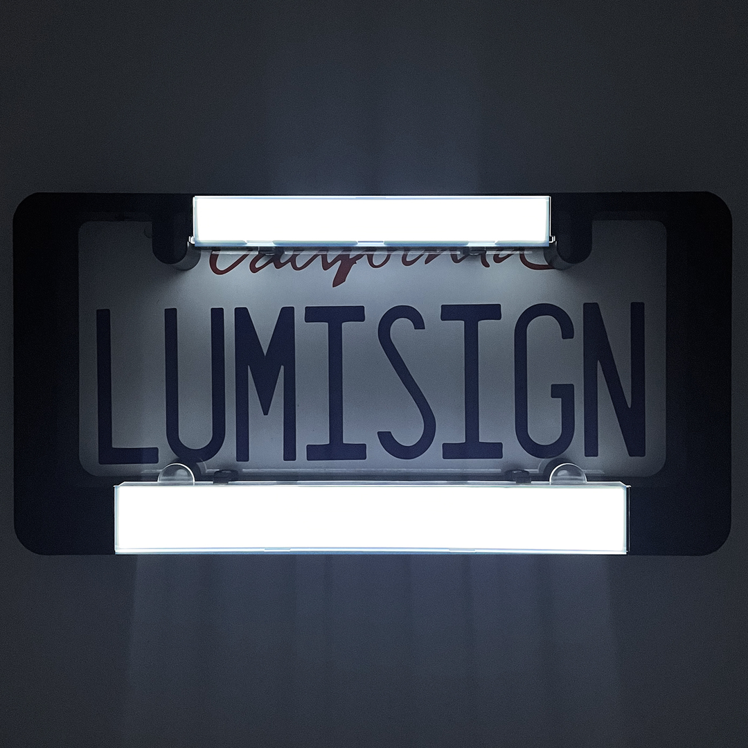 LumiSign illuminated license plate frame showing bright letters and white light bar