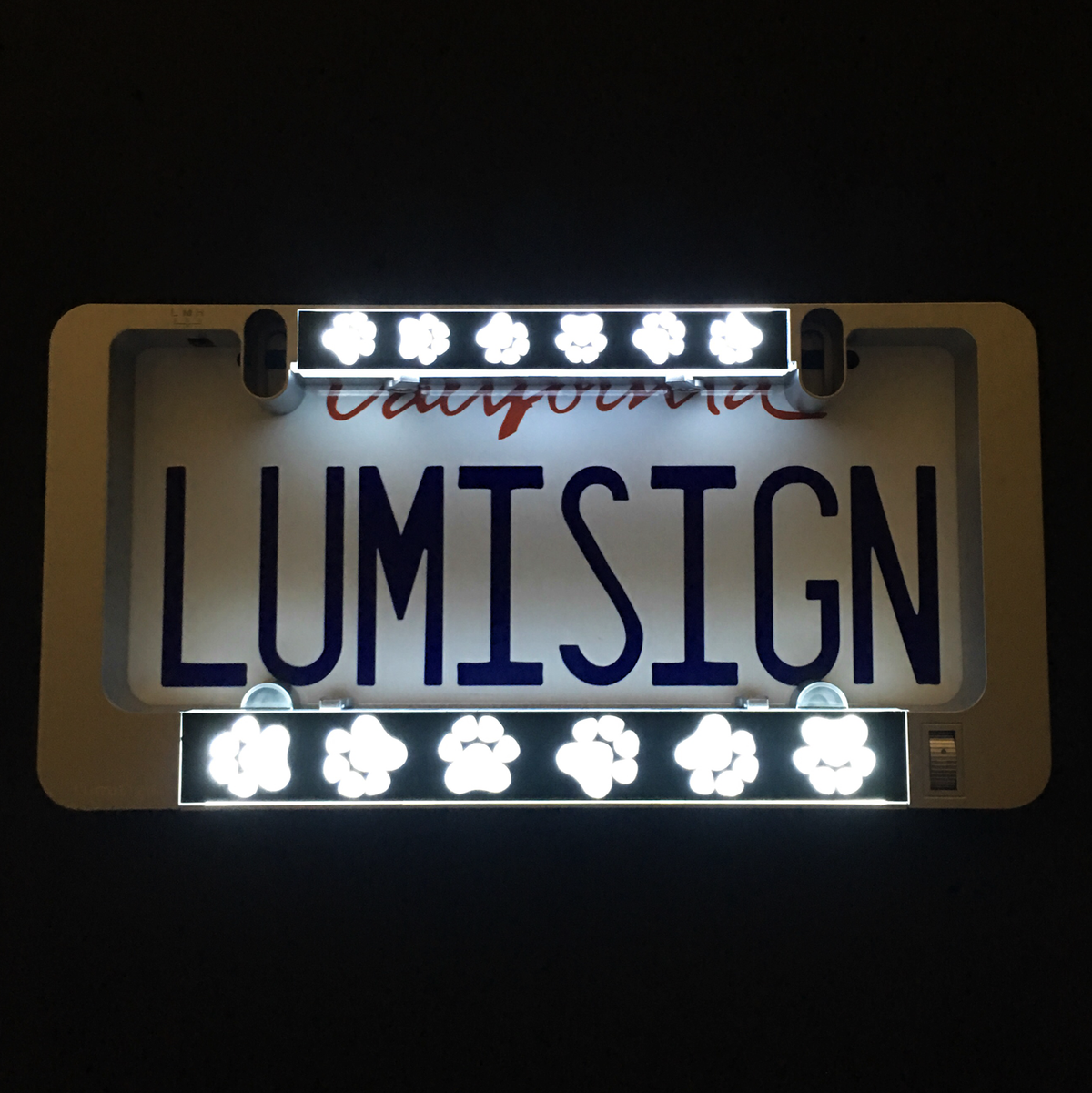 LumiSign paw print light insert bars, glowing paw icons above and below