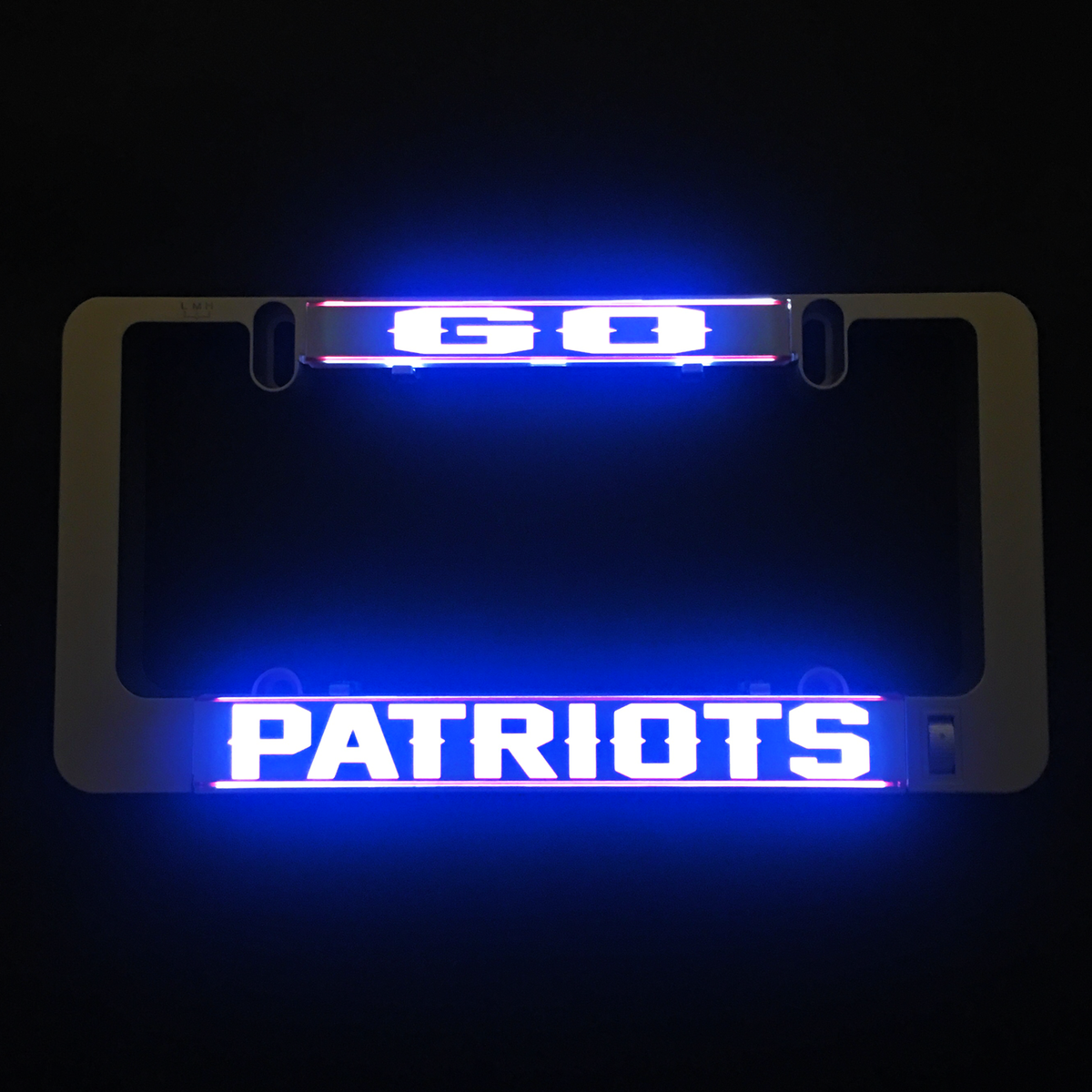 Illuminated LumiSign insert showing 'GO' and 'PATRIOTS' letters in blue light