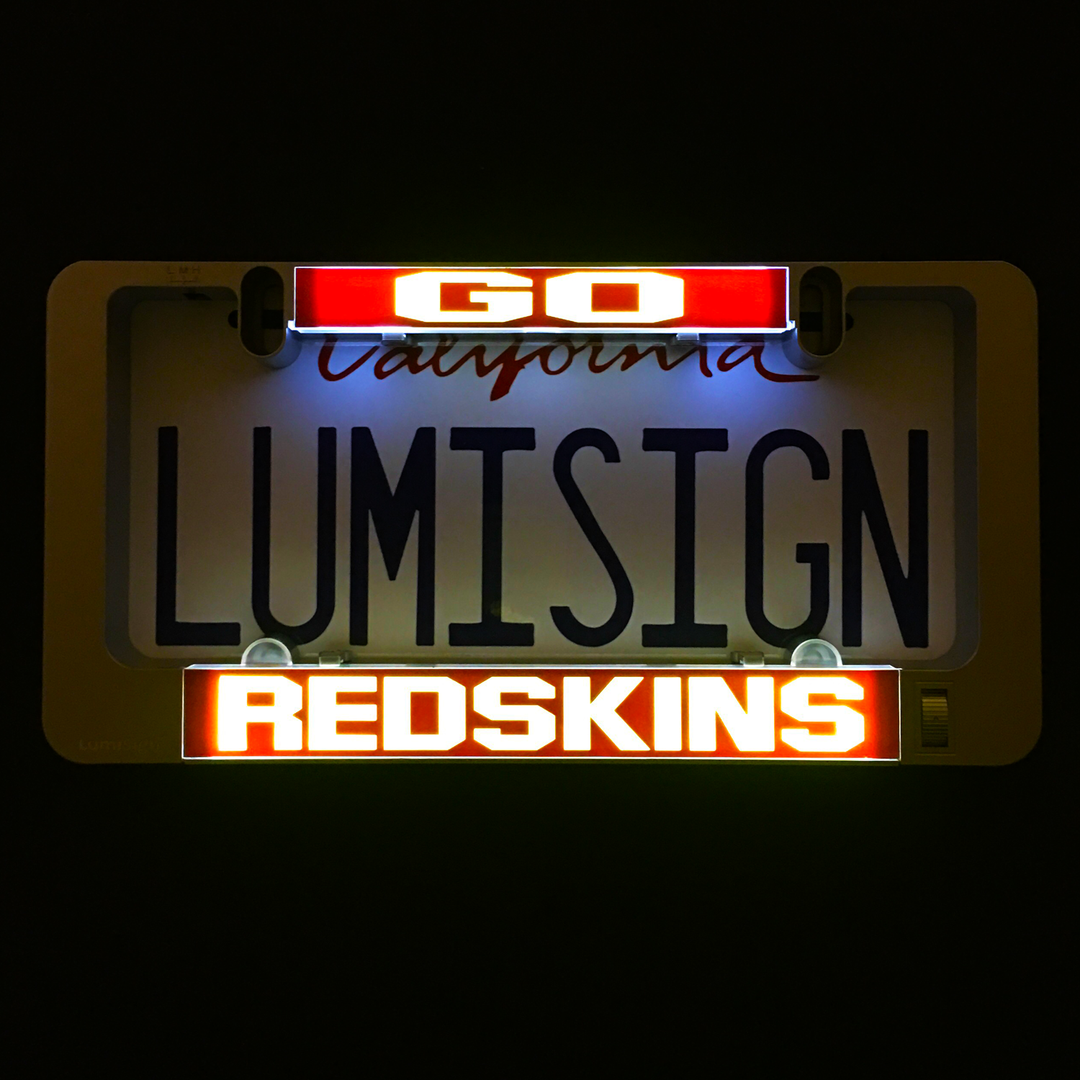 Illuminated LumiSign insert reading LUMISIGN with REDSKINS base panel