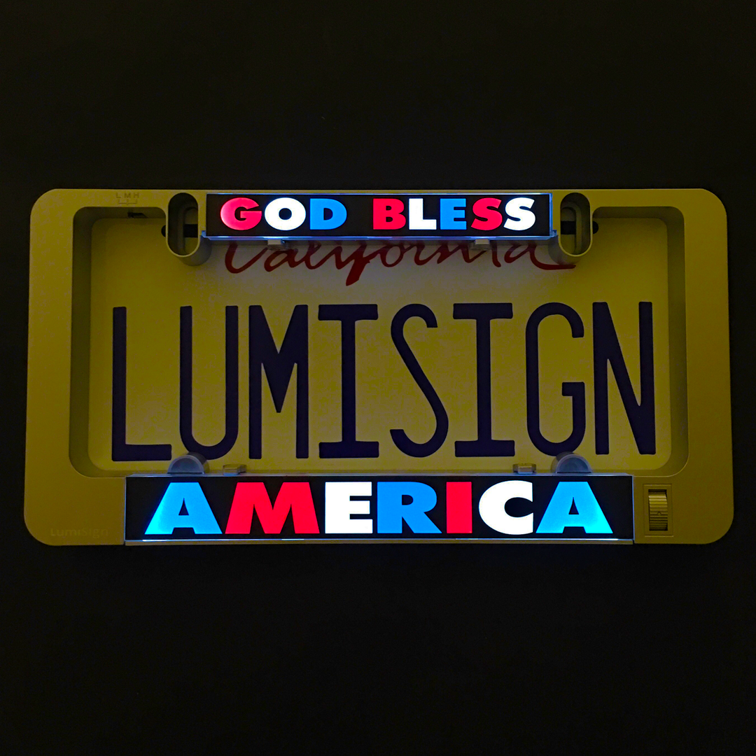 Illuminated LumiSign insert reading “God Bless” and “America”