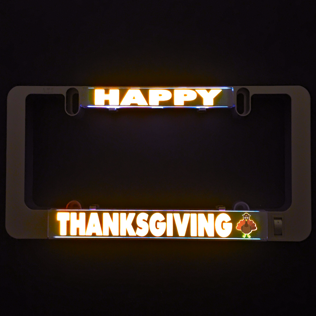 Illuminated Thanksgiving LumiSign insert reading “HAPPY” and “THANKSGIVING”