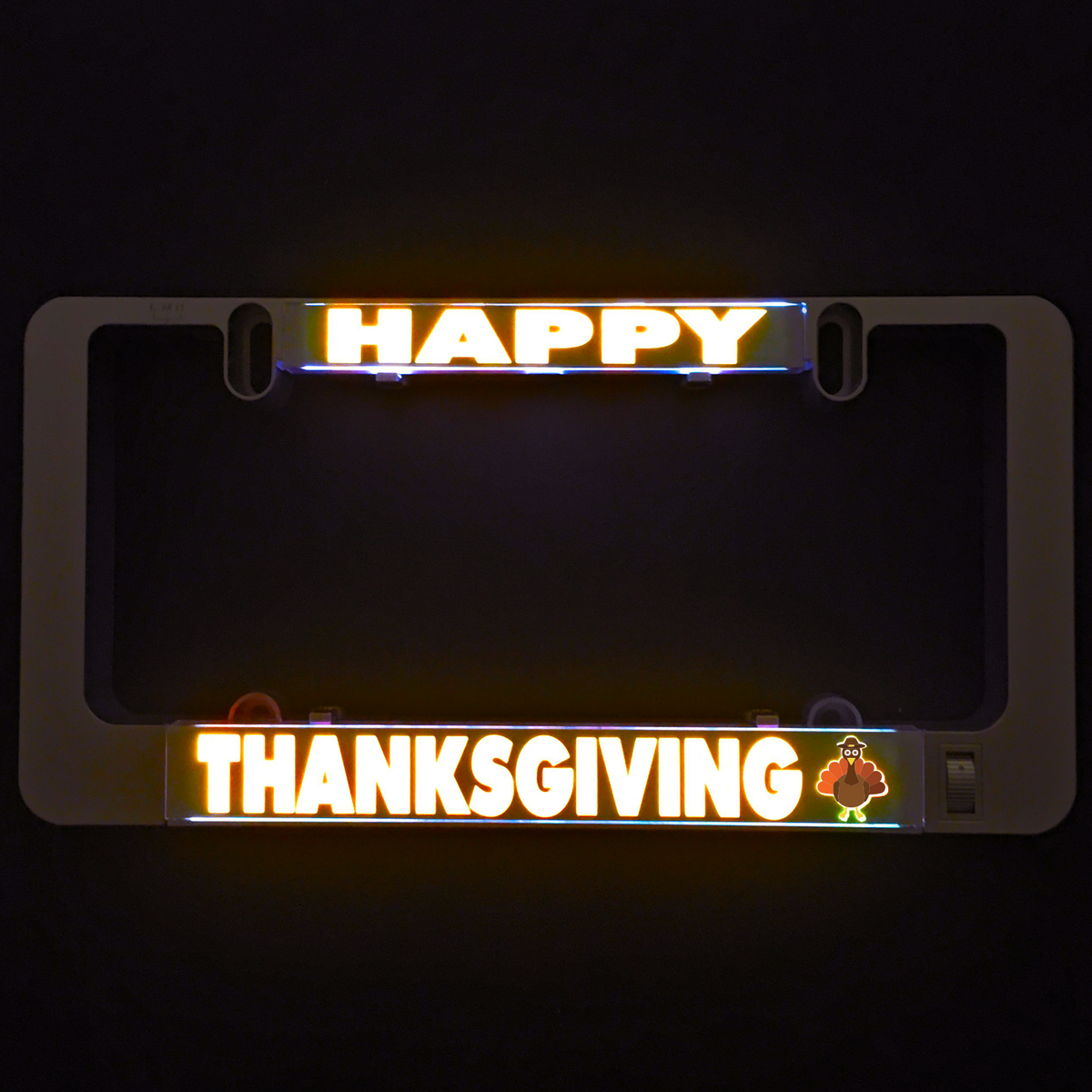 Illuminated Thanksgiving LumiSign insert reading “HAPPY” and “THANKSGIVING”