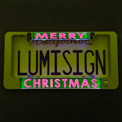 LumiSign Christmas light inserts glowing with “LUMISIGN” and “CHRISTMAS” text
