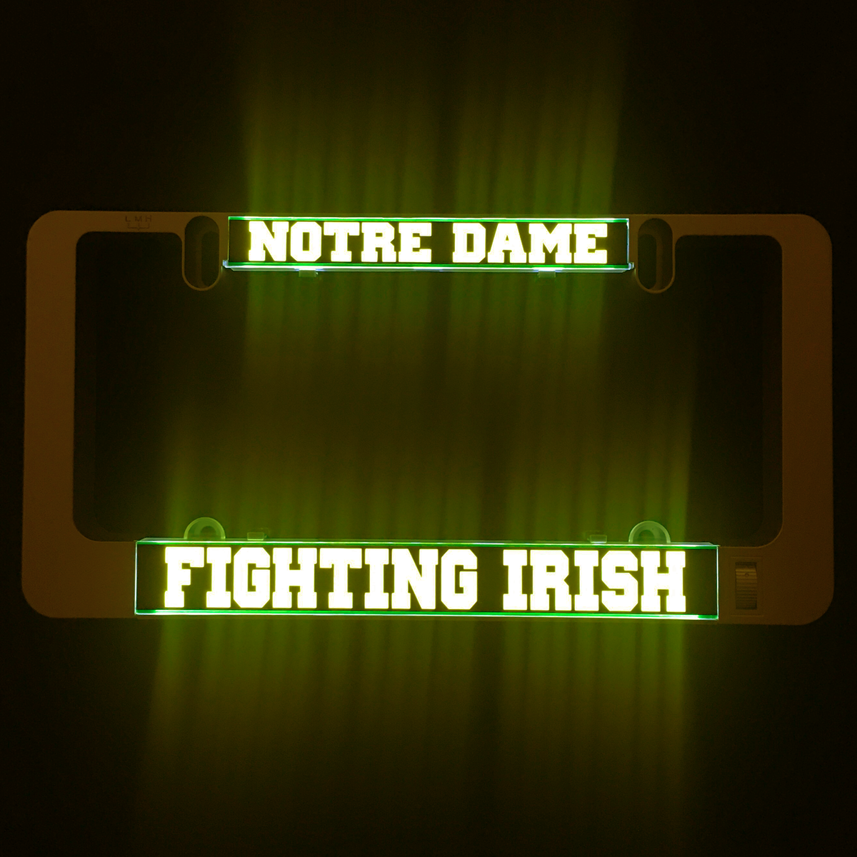 LumiSign insert glowing green with Notre Dame above Fighting Irish