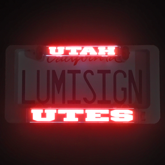Illuminated UTAH UTES LumiSign inserts with red glowing UTAH and UTES text