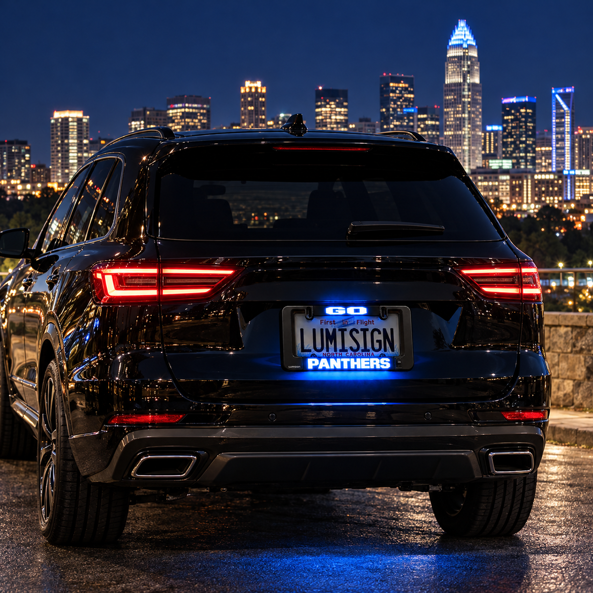 Black car license plate frame with red LED taillights and blue LUMISIGN Panthers display