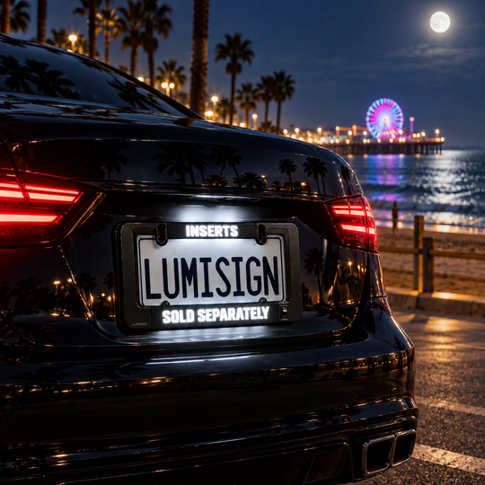 Black car rear license plate frame with LumiSign badge reading “SOLD SEPARATELY”