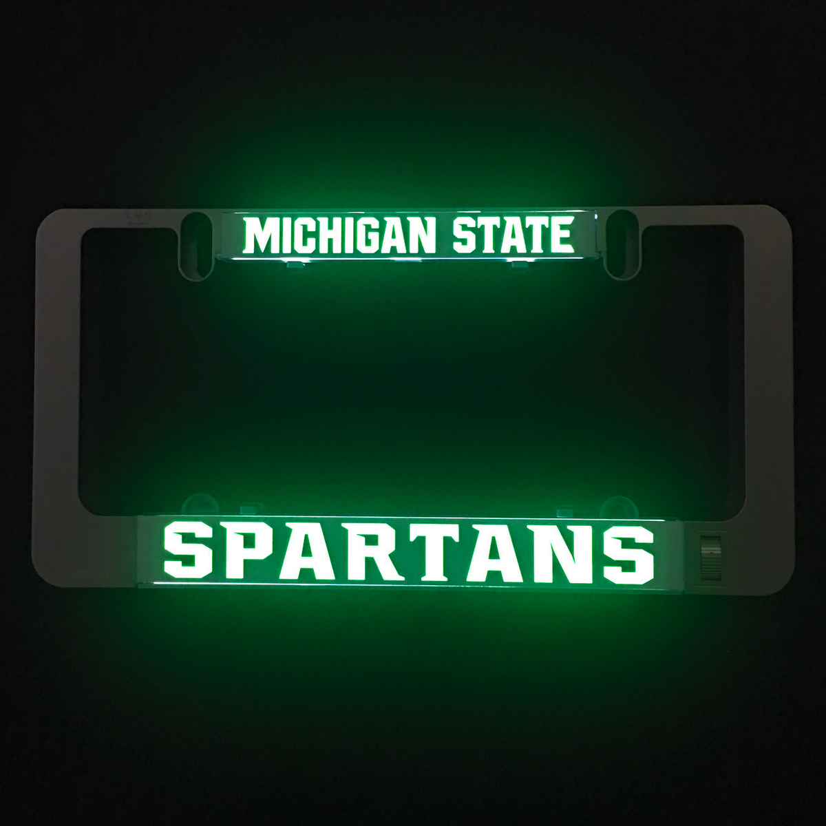 LumiSign insert displaying MICHIGAN STATE and SPARTANS in green light