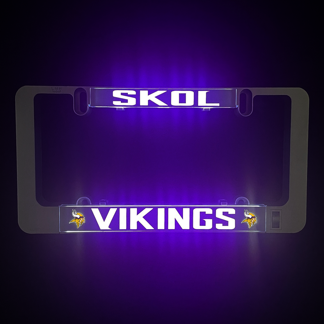 Illuminated LumiSign Vikings insert with SKOL and VIKINGS text in purple light