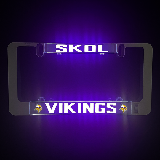 Illuminated LumiSign Vikings insert with SKOL and VIKINGS text in purple light