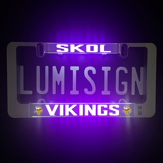 LumiSign Vikings and SKOL insert illuminated in purple on dark background