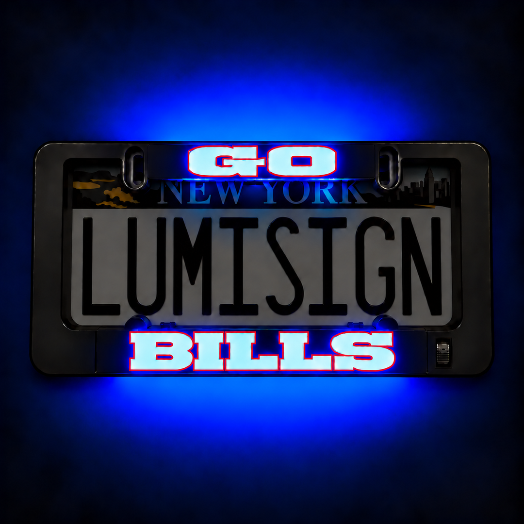 Close-up black license plate frame reading “LUMISIGN BILLS” with blue/red light