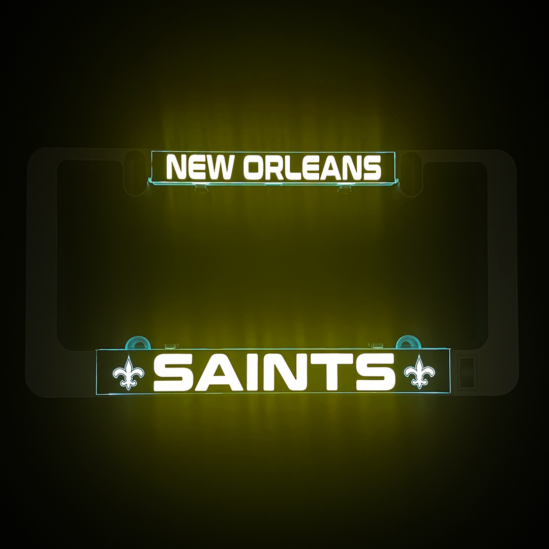 LumiSign license plate insert with New Orleans Saints logo and green glow
