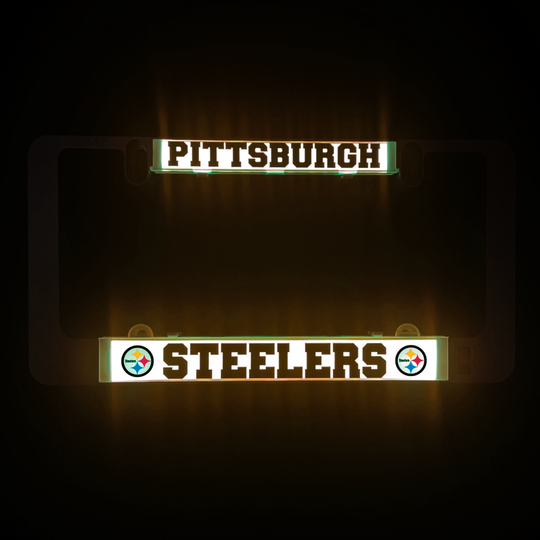 LumiSign frame inserts with Pittsburgh and Steelers logo glowing in green and gold