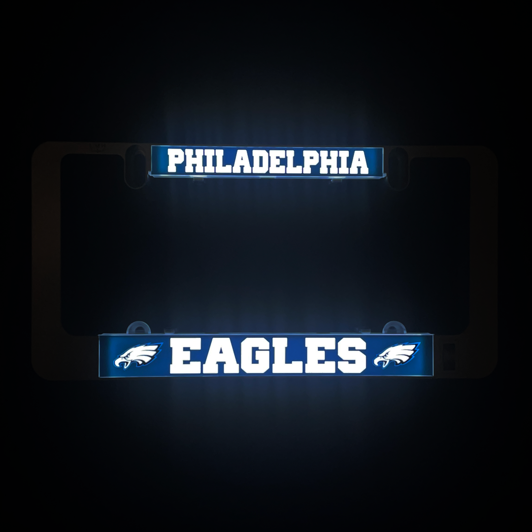 LumiSign frame with Philadelphia and Eagles illuminated inserts, blue glow over teal panels