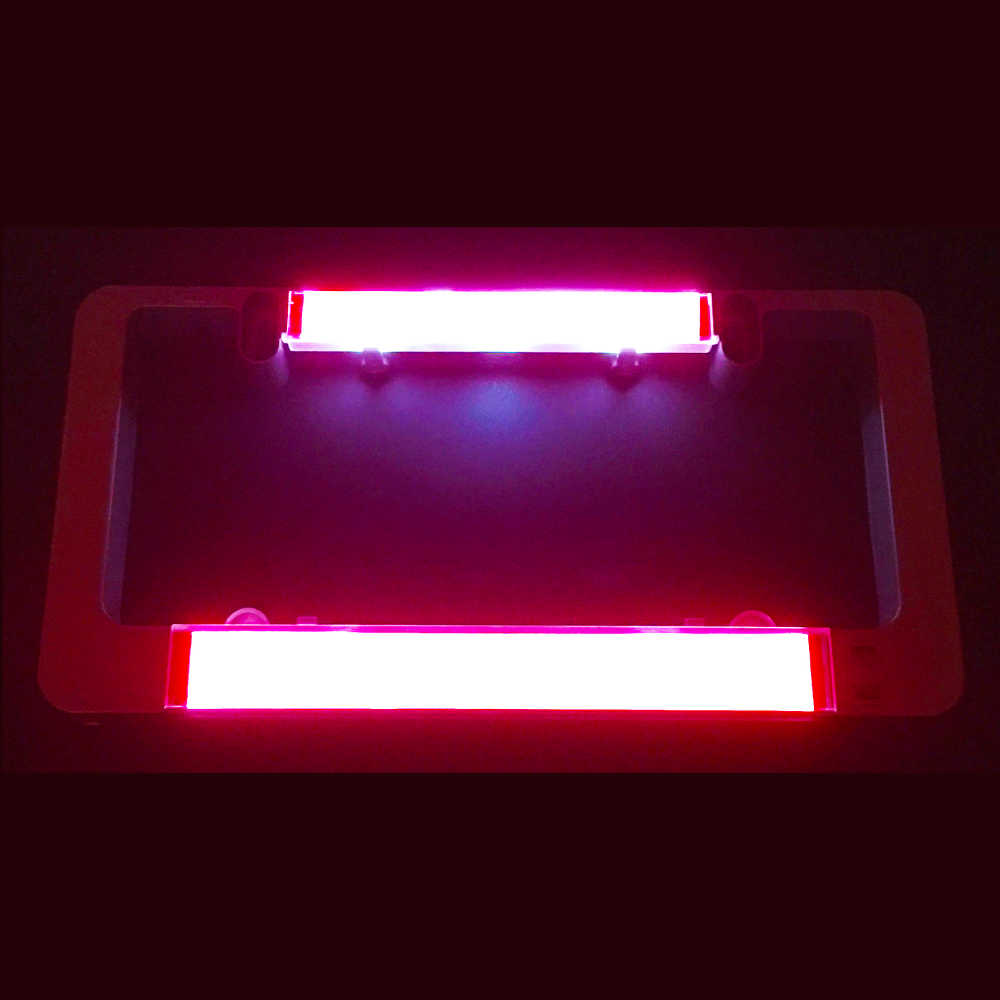Red illuminated brake light insert bars for LumiSign in a dark housing