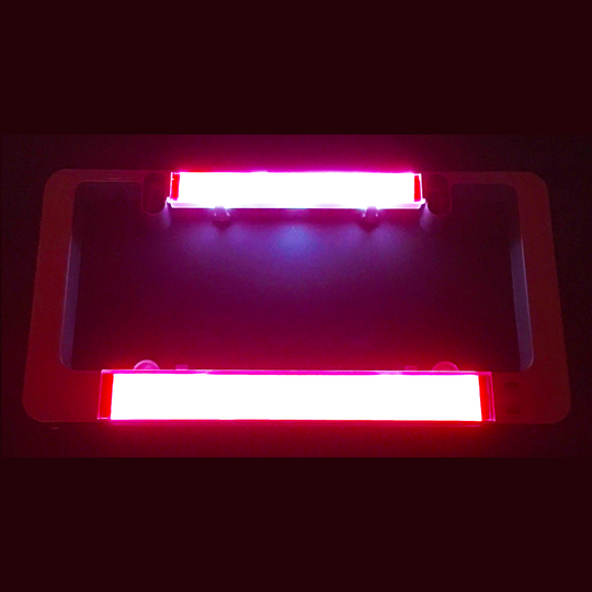Red illuminated brake light insert bars for LumiSign in a dark housing