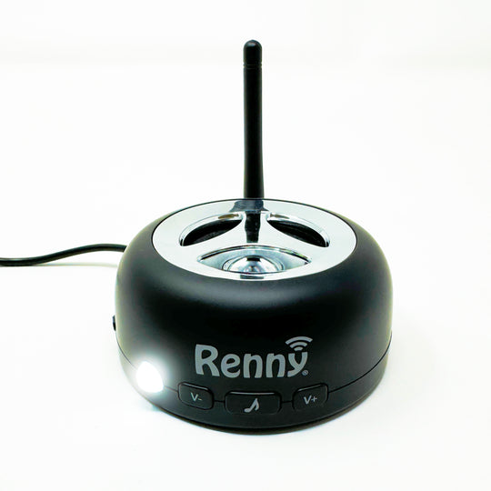 Loud cell phone ringer base with top speaker dial and control buttons