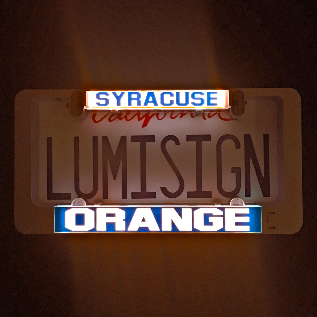 Backlit LumiSign inserts reading Syracuse and Orange in blue and orange