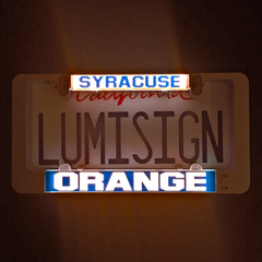 Backlit LumiSign inserts reading Syracuse and Orange in blue and orange