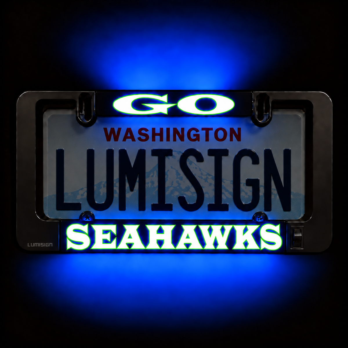 Close-up LED license plate frame with blue glow, showing Washington and Seahawks