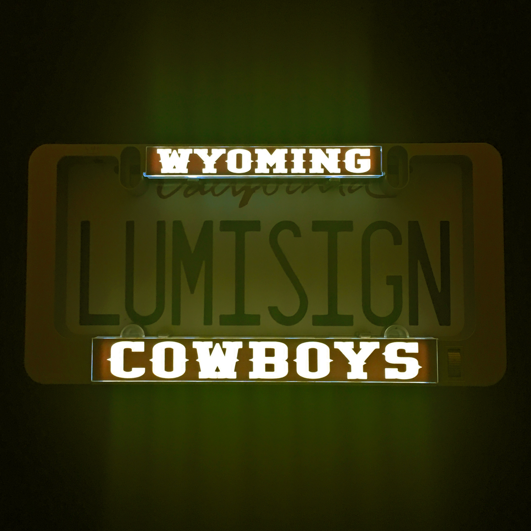 LuminSign insert showing glowing Wyoming and Cowboys text
