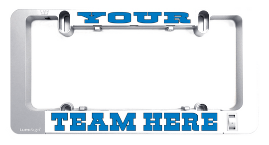 Grey lighted license plate frame with mounting brackets and blue team text insert