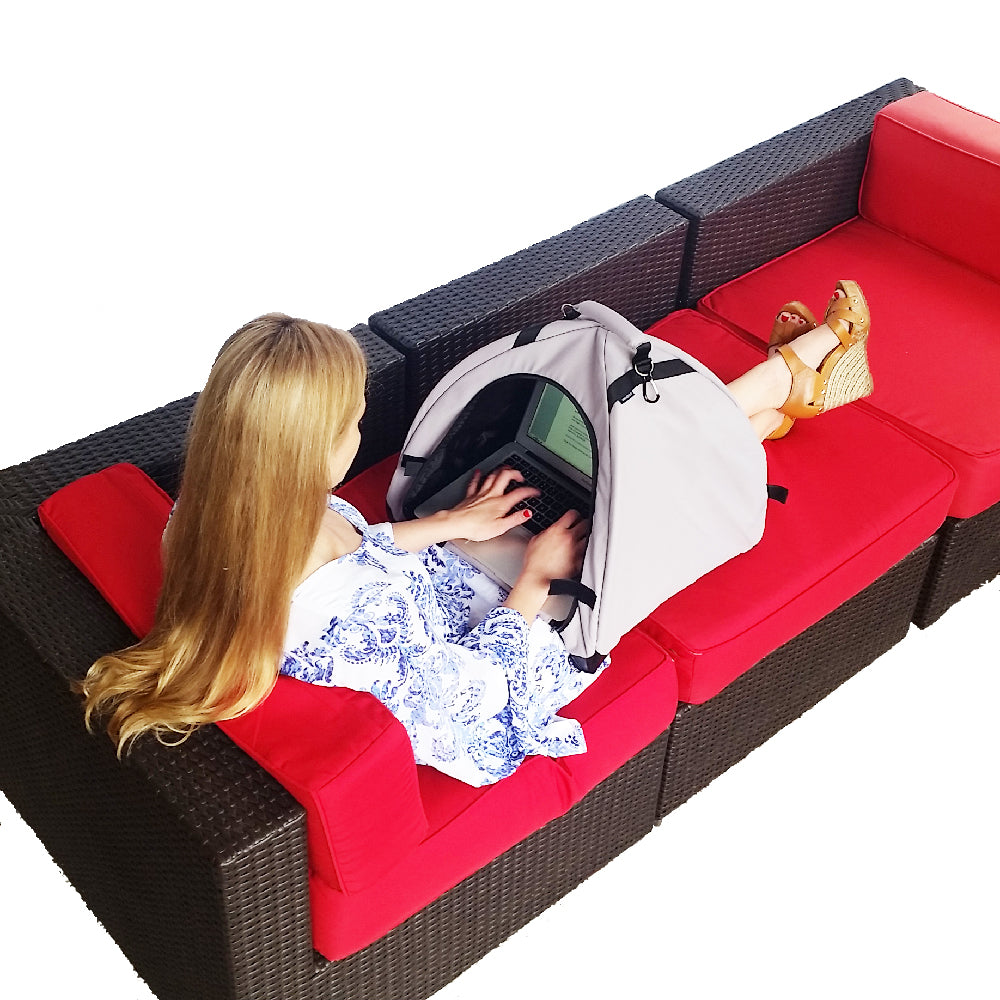 Laptop tent with viewing window over a couch, light gray and black fabric